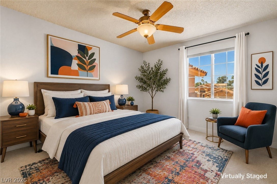 1827 Escondido Terrace, Henderson, NV 89074 An inviting bedroom with plush carpeting, offering a restful retreat with soft overhead lighting.
