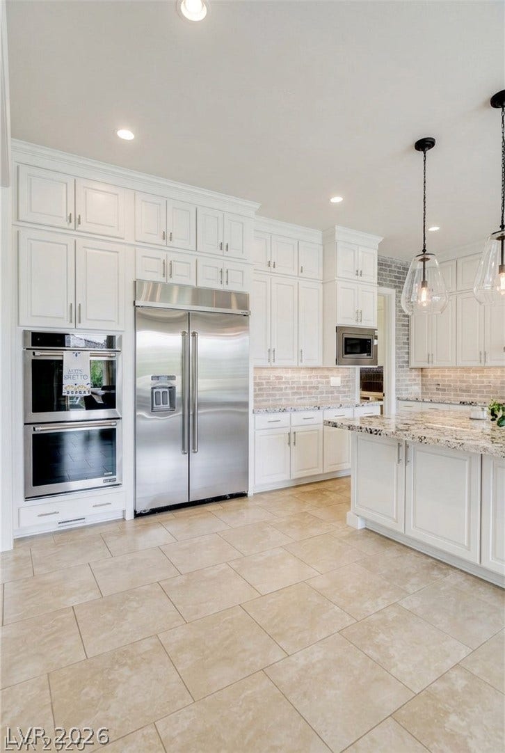 12013 Tramonto Avenue, Las Vegas, NV 89138 Optional white cabinets with accepted offer.