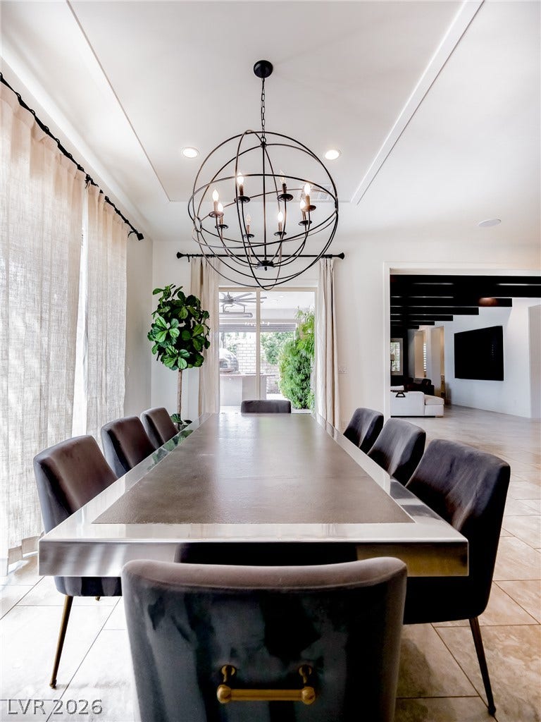 12013 Tramonto Avenue, Las Vegas, NV 89138 An open floor plan connects the dining area to the main living spaces.