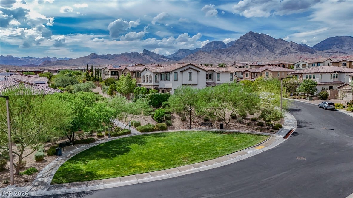12013 Tramonto Avenue, Las Vegas, NV 89138 Dramatic mountain ranges provide a majestic backdrop to this quiet suburban neighborhood.