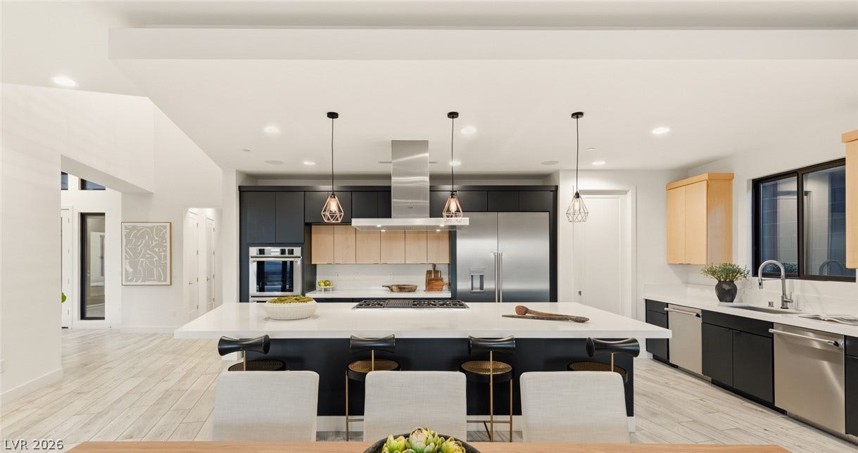 2208 Overlook Canyon Lane, Henderson, NV 89052 A contemporary culinary space with a large island and ample storage, perfect for entertaining.