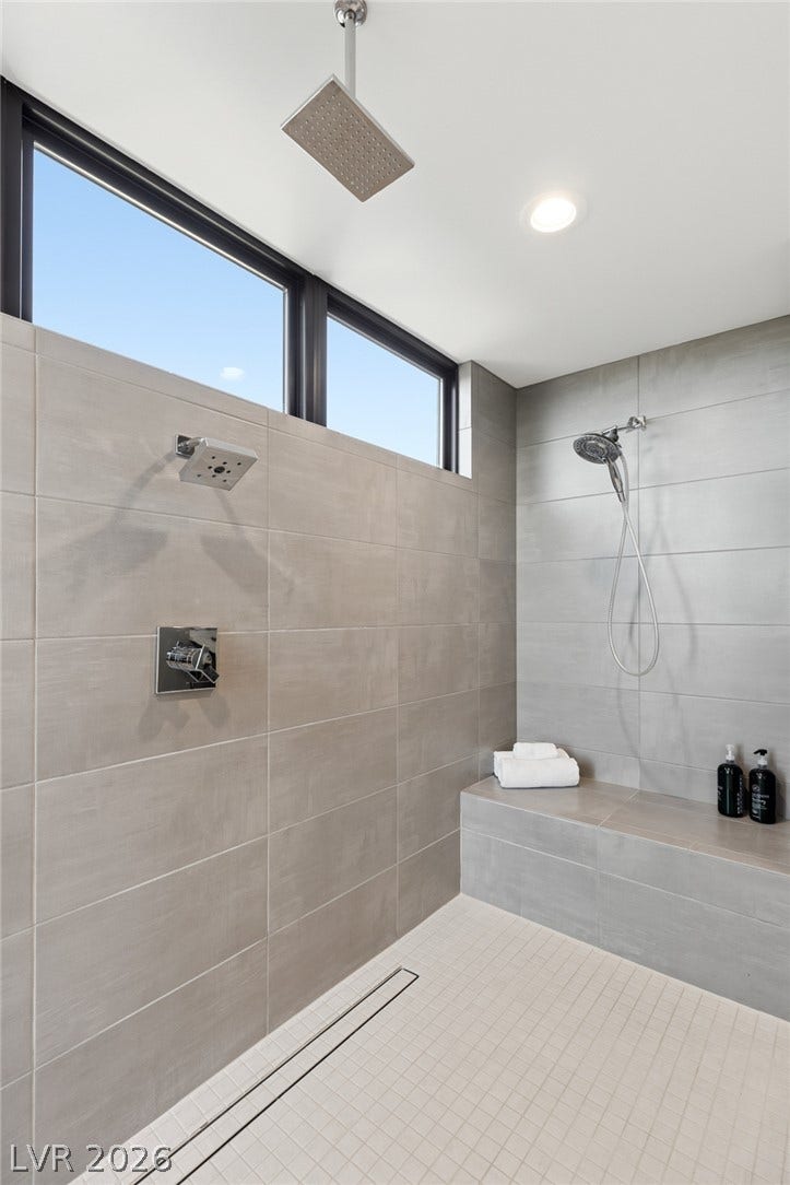 2208 Overlook Canyon Lane, Henderson, NV 89052 Rainfall shower heads and modern tiling create a serene bathing experience.