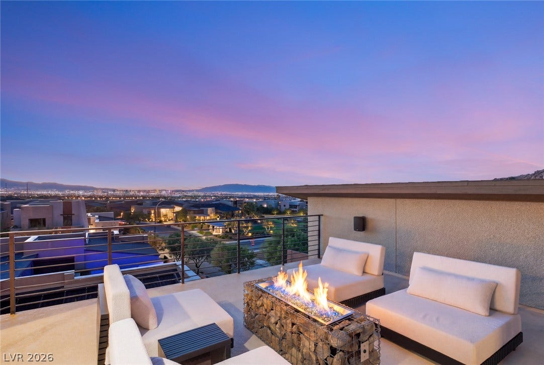 2208 Overlook Canyon Lane, Henderson, NV 89052 Rooftop deck offers captivating city views and a cozy fire pit.