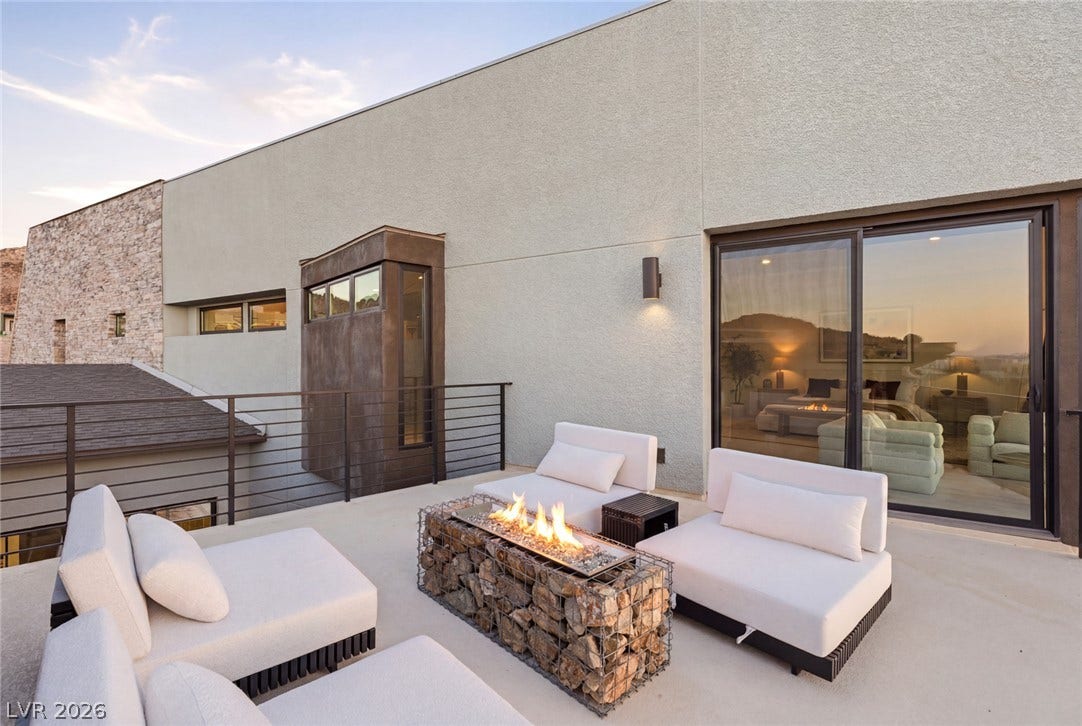 2208 Overlook Canyon Lane, Henderson, NV 89052 An inviting outdoor fire feature anchors this contemporary patio space with panoramic views.