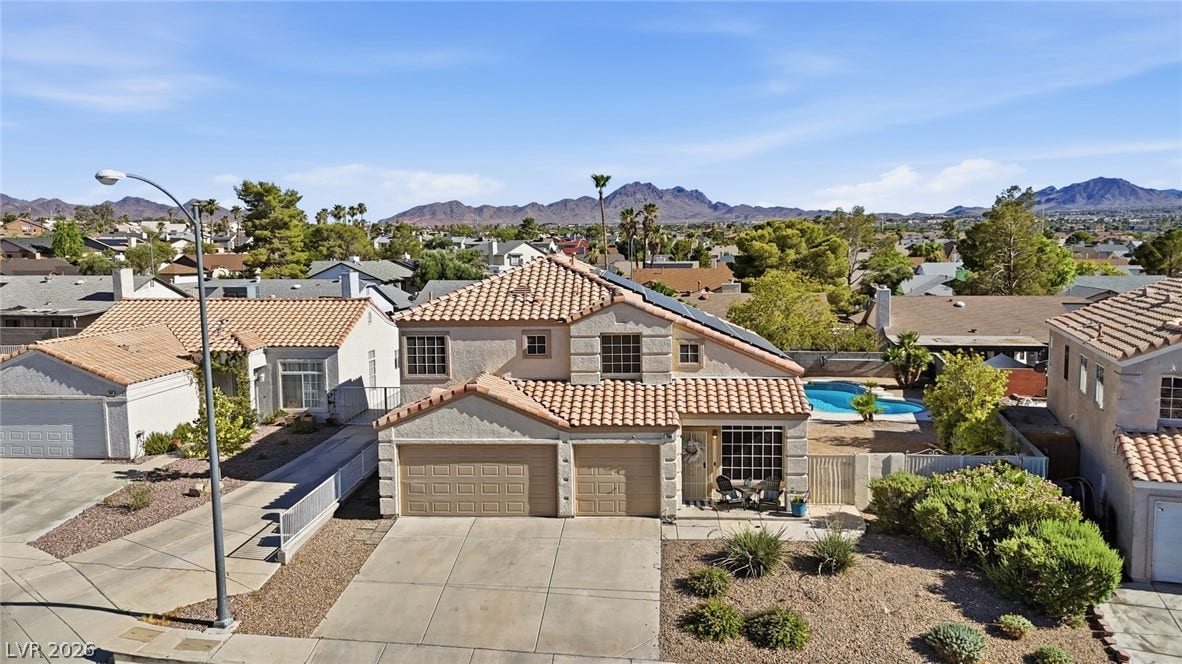 206 Oleander Place, Henderson, NV 89015 A desert oasis with a private pool and mountain views from every angle.