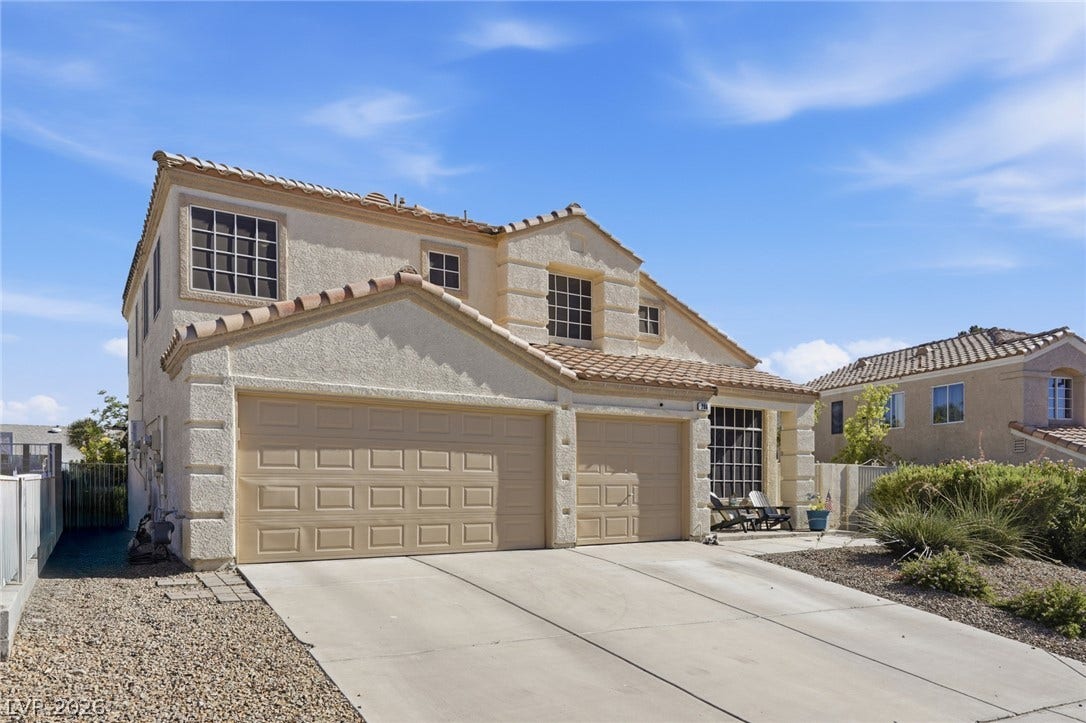 206 Oleander Place, Henderson, NV 89015 A well-maintained stucco home with a tile roof and attached garage awaits.