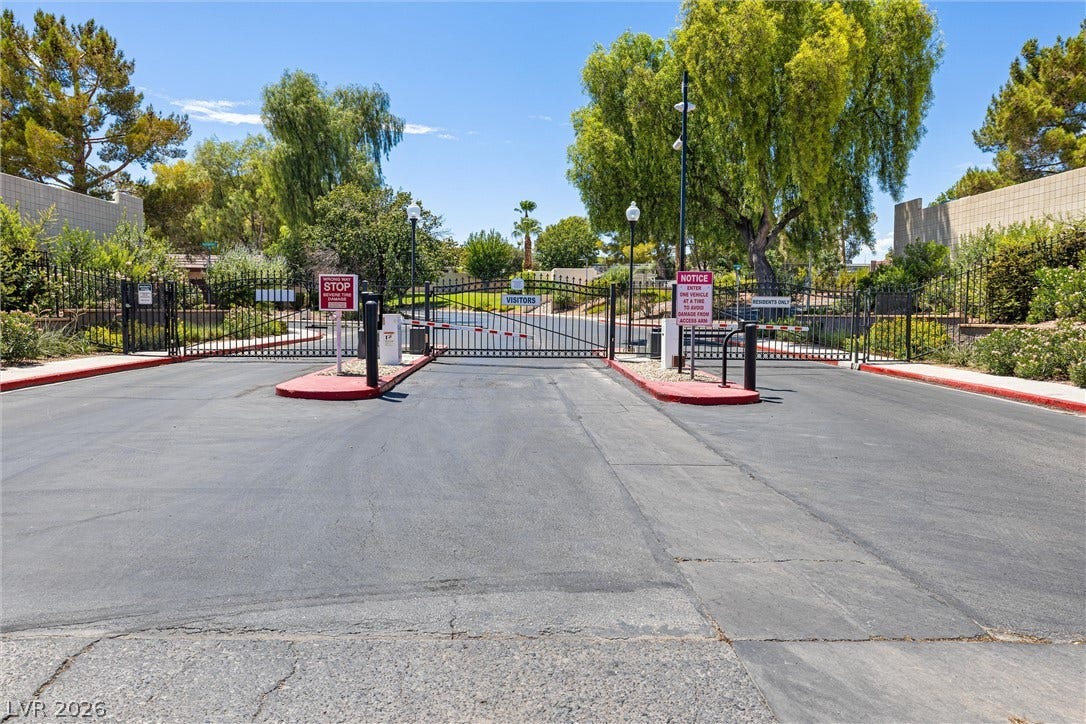 3303 Royce Court, Las Vegas, NV 89121 Secure community entrance with an ornamental gate offers peace of mind and regulated access.