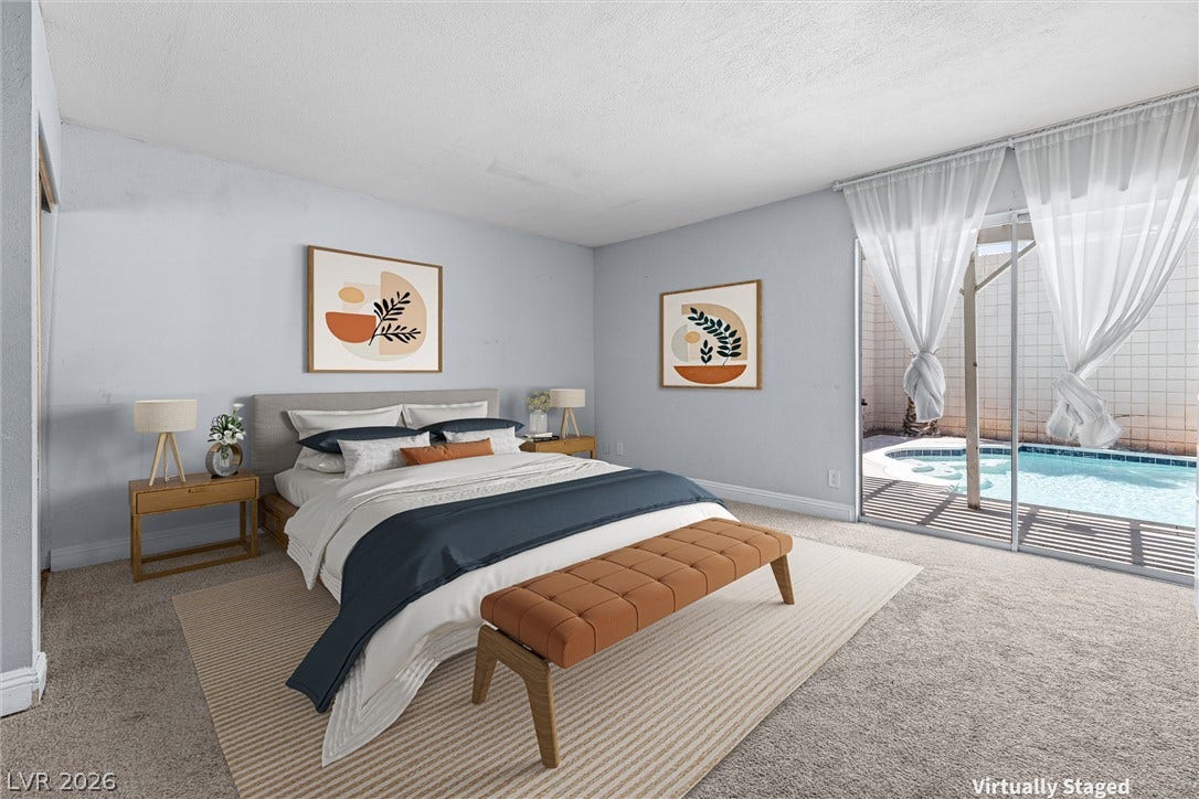 3303 Royce Court, Las Vegas, NV 89121 Step into a serene bedroom retreat with direct access to a private pool oasis.