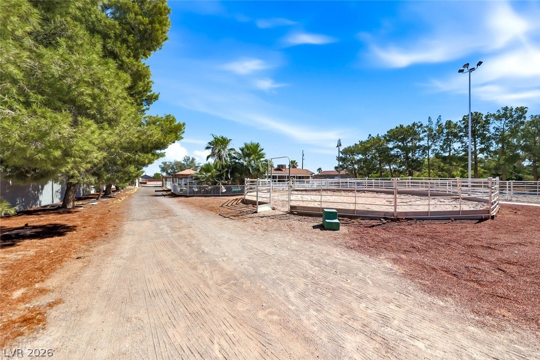 An equestrians dream, featuring a spacious outdoor arena ready for training and exercise.
