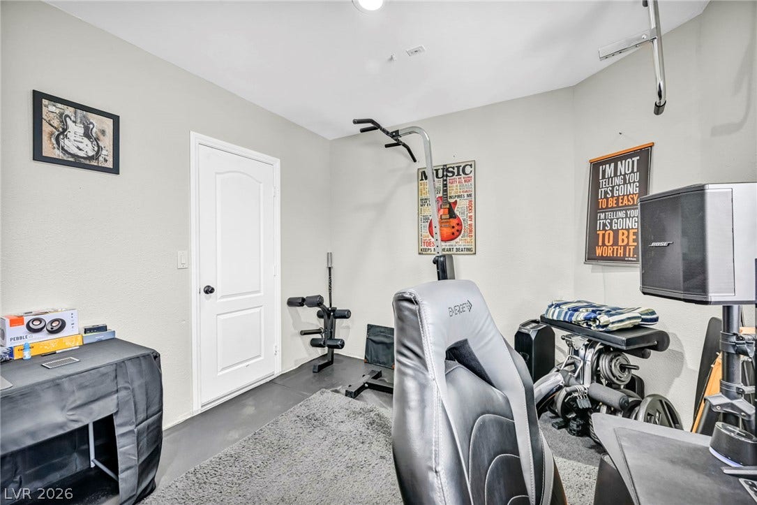 Dedicate a well-lit space to personal wellness, perfect for a home gym.