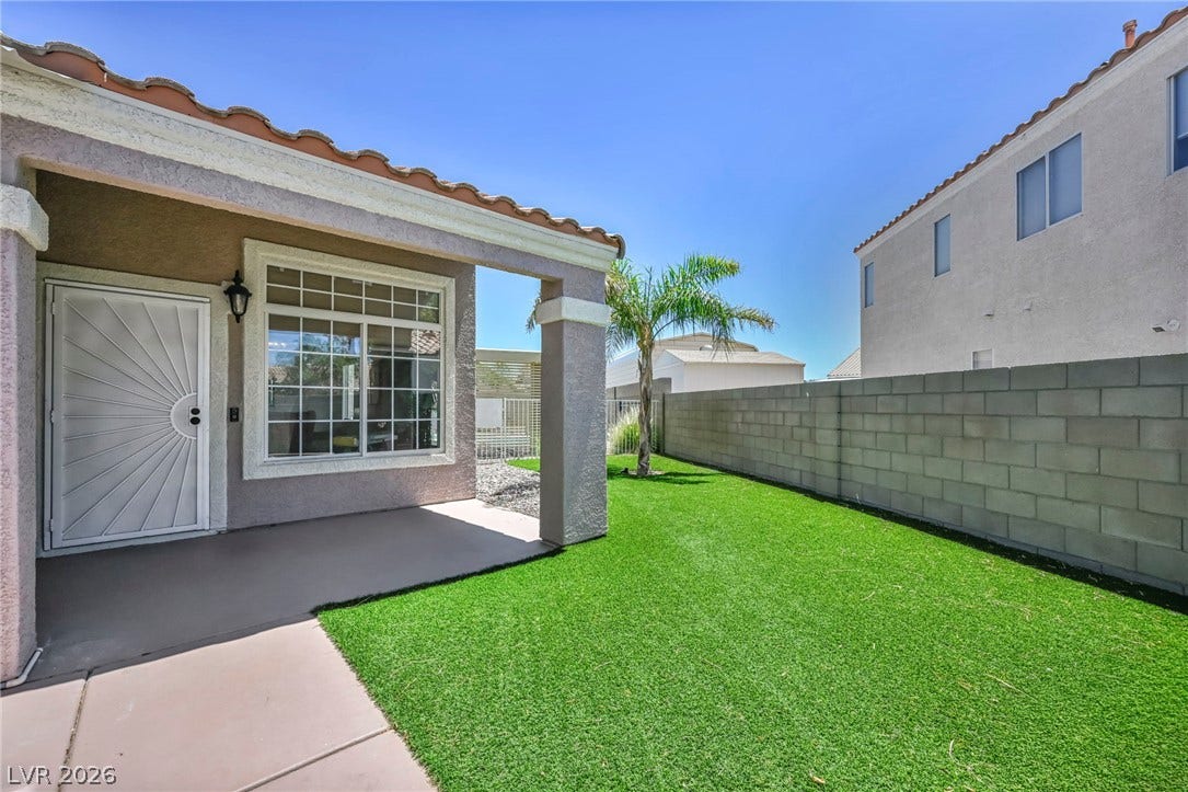 A well-maintained backyard offers a private outdoor area for relaxation.