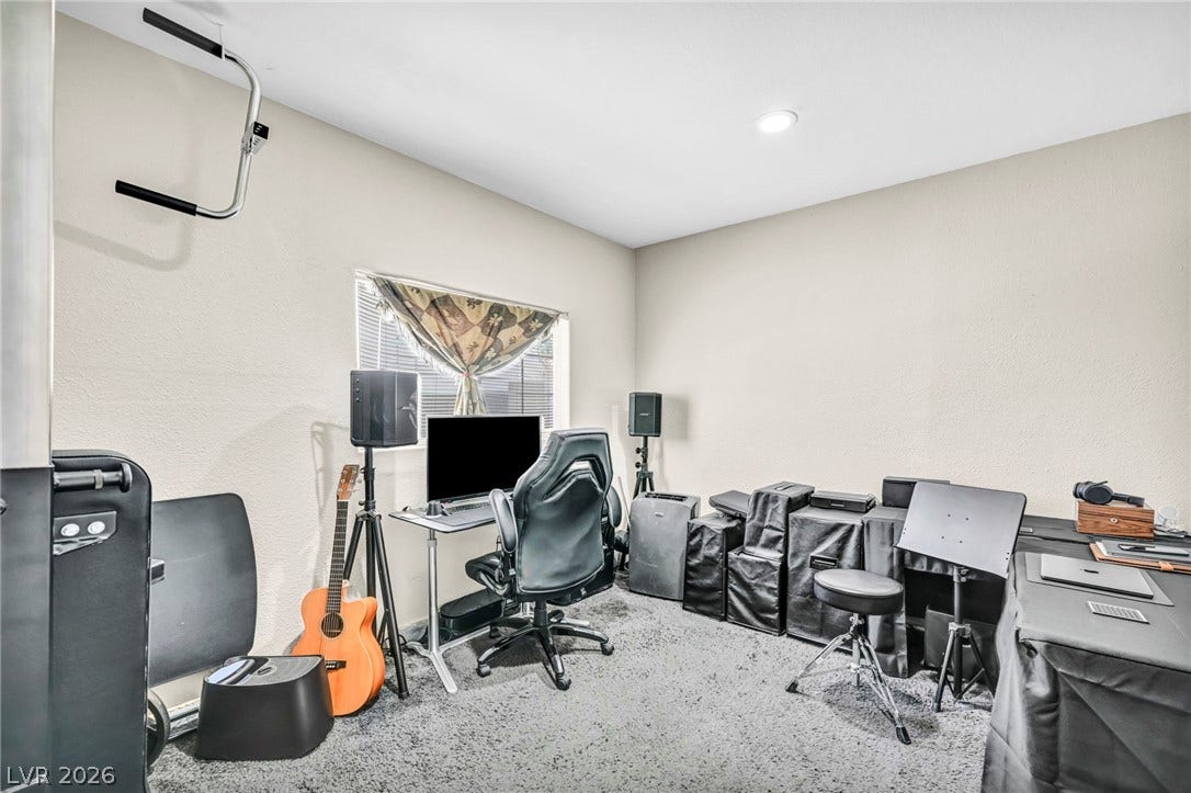 A versatile home office, music studio, or creative space, perfect for work or leisure.