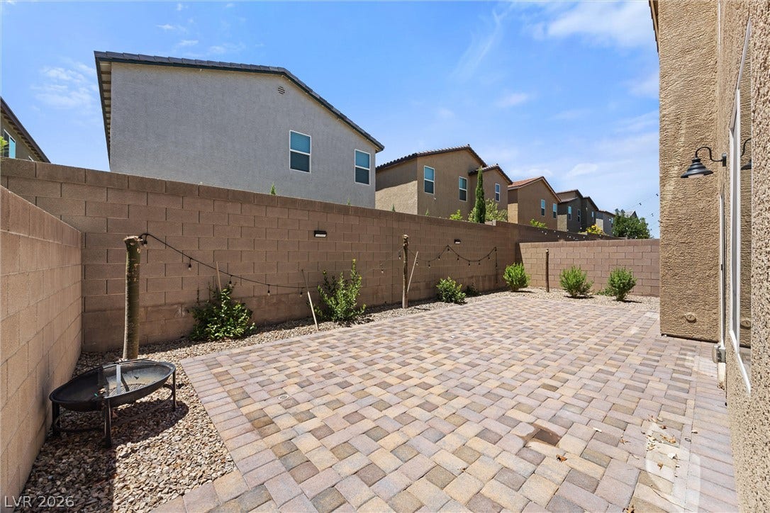 8943 Pelican Point Street, Las Vegas, NV 89178 A fully paved backyard offers a versatile space for outdoor living and entertaining.