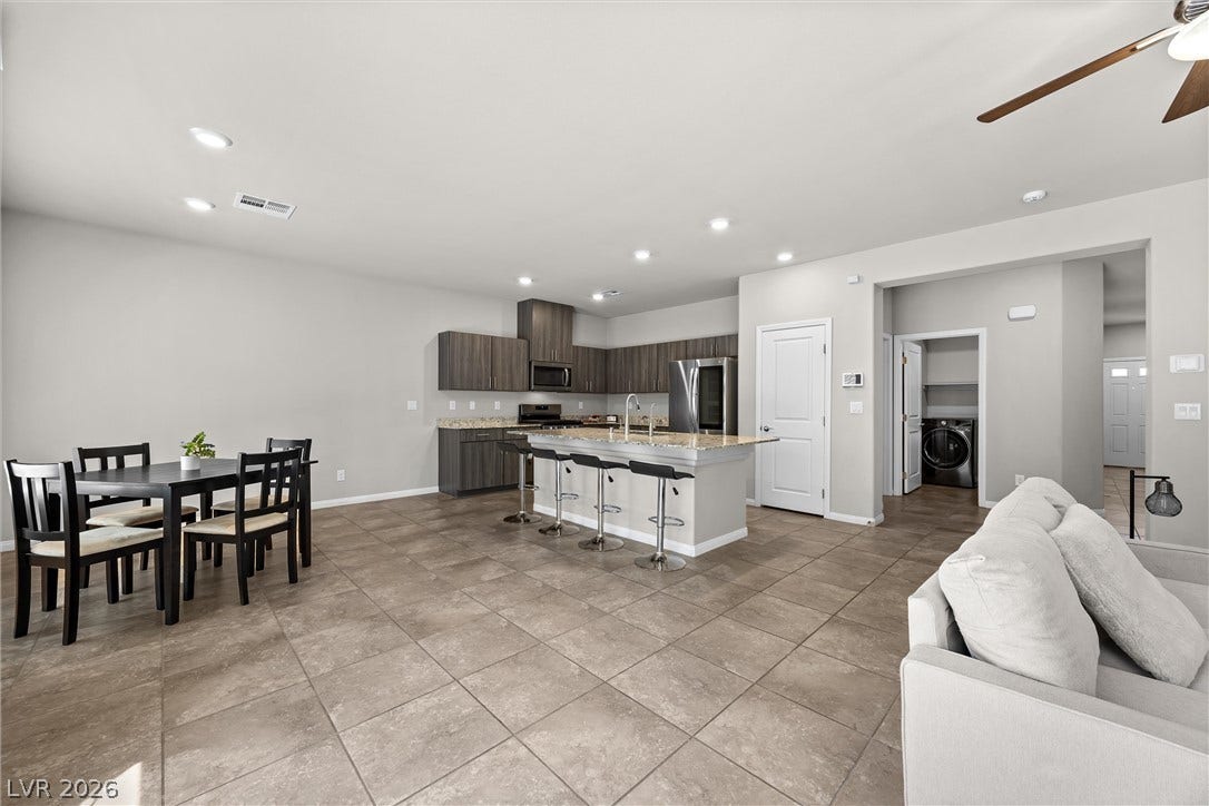8943 Pelican Point Street, Las Vegas, NV 89178 A well-appointed kitchen and dining area provide a seamless flow for everyday living and entertaining.
