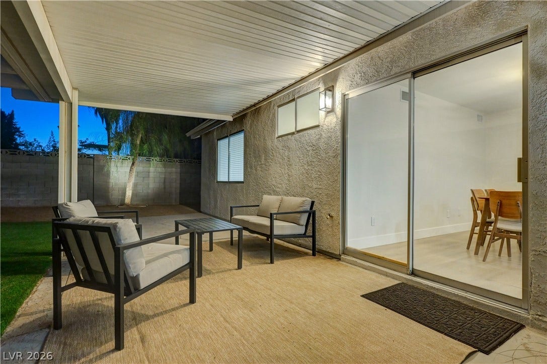 3131 White Rose Way, Henderson, NV 89014 An inviting covered patio offers a private outdoor retreat for relaxation and entertainment.