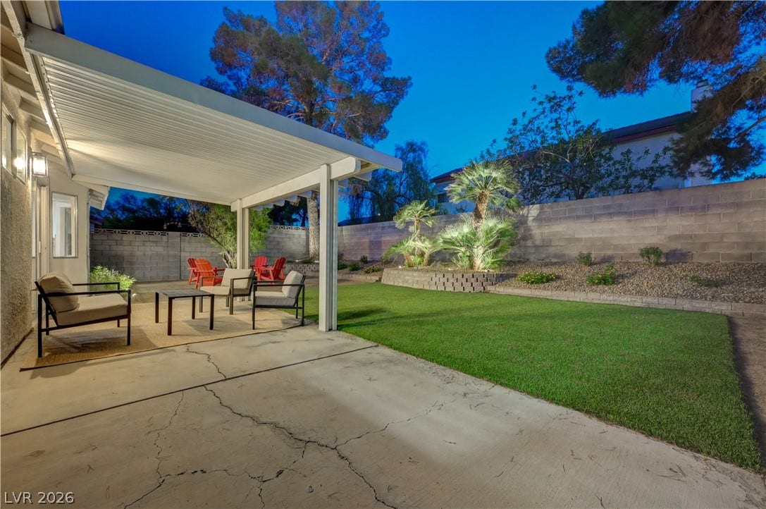 3131 White Rose Way, Henderson, NV 89014 Entertain guests on the shaded patio or unwind in the verdant, well-lit yard.
