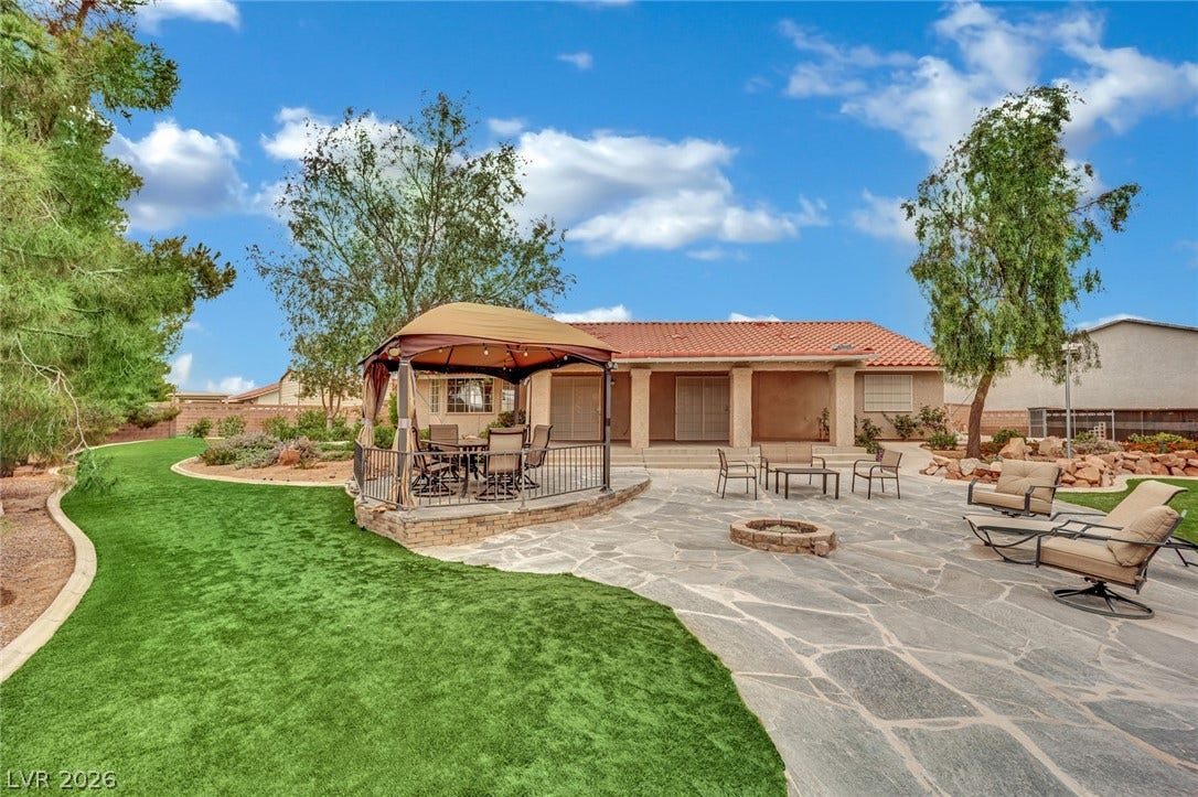 9180 Mohawk Street, Las Vegas, NV 89139 View of patio / terrace with a fire pit