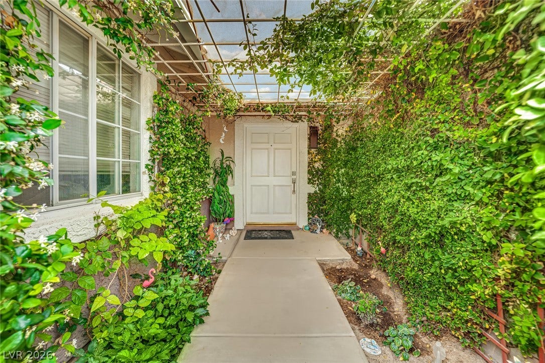 9180 Mohawk Street, Las Vegas, NV 89139 Doorway to property past privacy gate