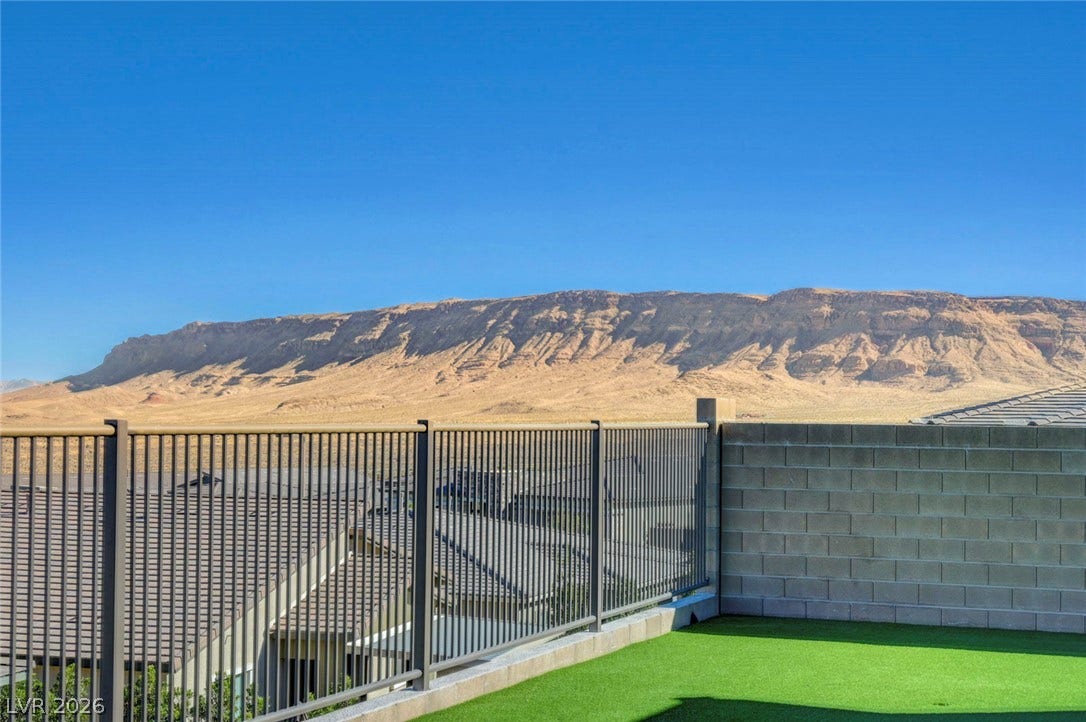 Uninterrupted desert mountain views define this captivating outdoor space.