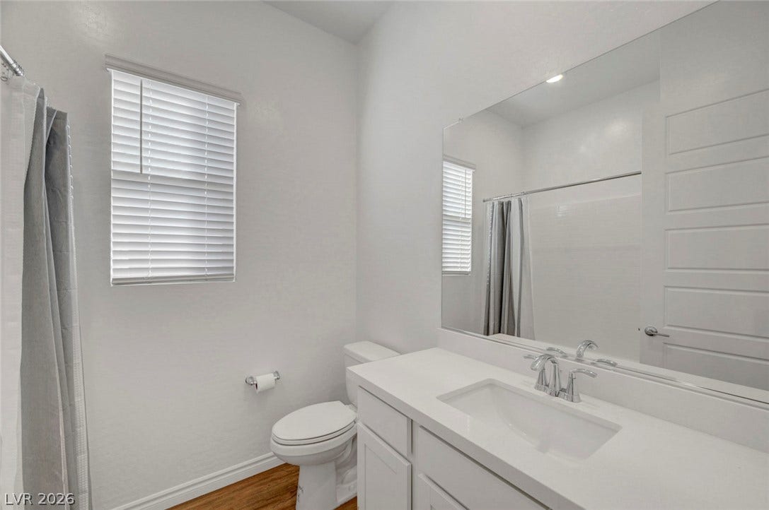 A well-appointed bathroom featuring clean lines and a functional design.