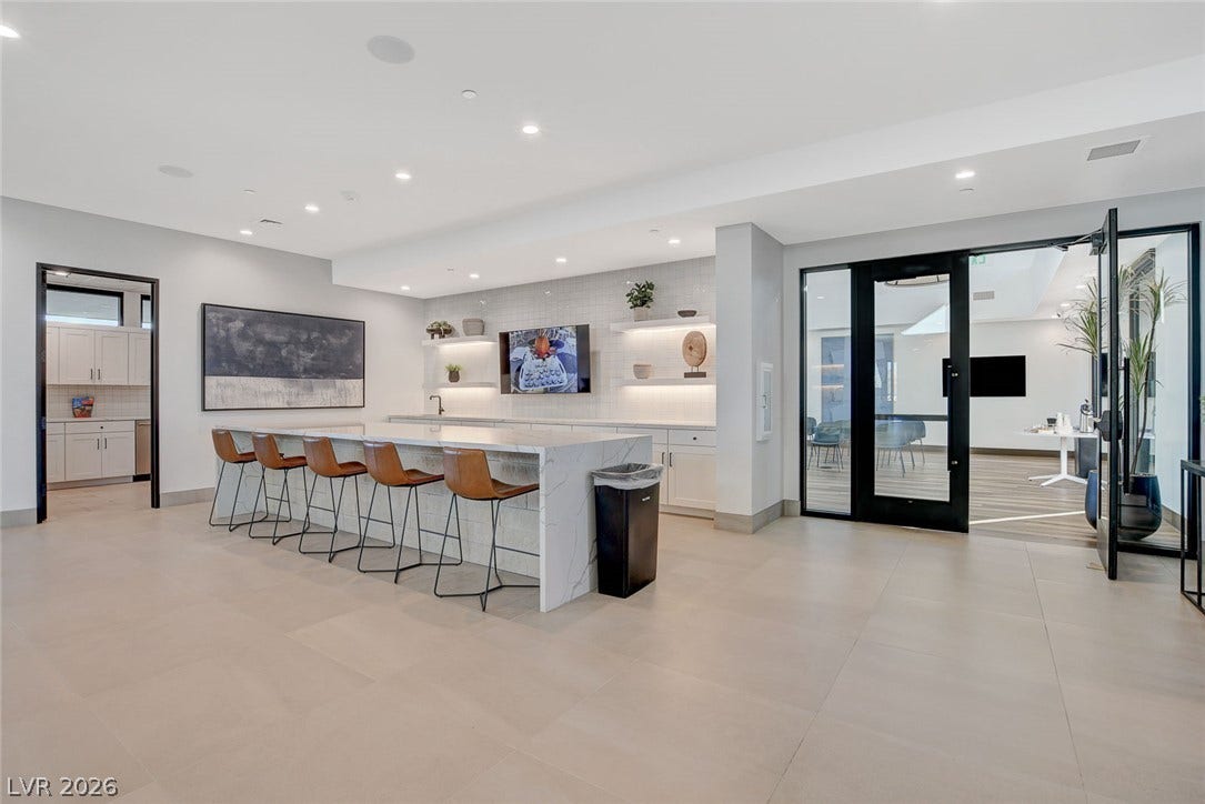 A spacious common area offers abundant seating and modern finishes perfect for community gatherings.