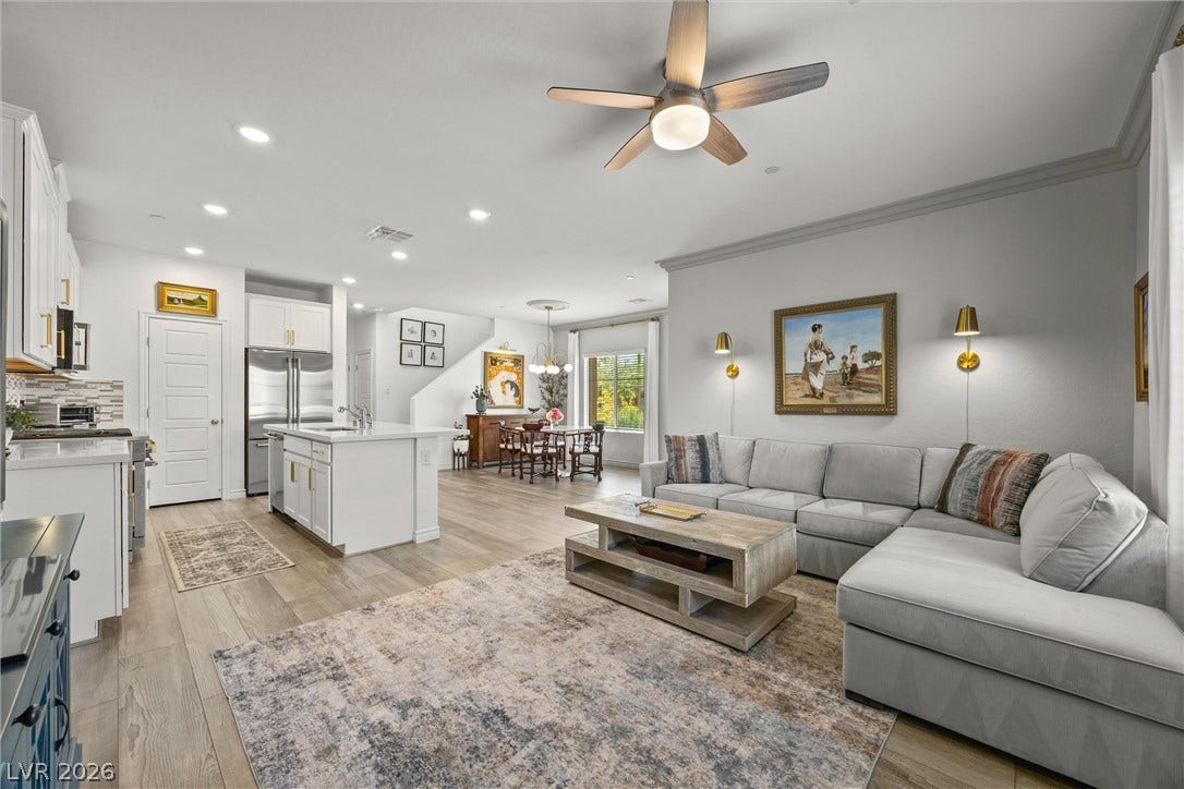 600 N Carriage Hill Drive, #1034, Las Vegas, NV 89138 An open-concept design with recessed lighting, an eat-in kitchen, and wood flooring creates an inviting atmosphere.
