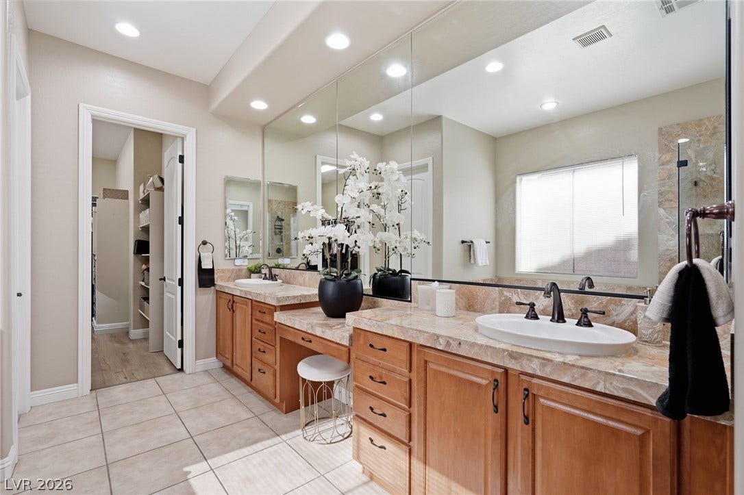 2397 Luberon Drive, Henderson, NV 89044 Double vanities with ample counter space and abundant storage offer everyday convenience.