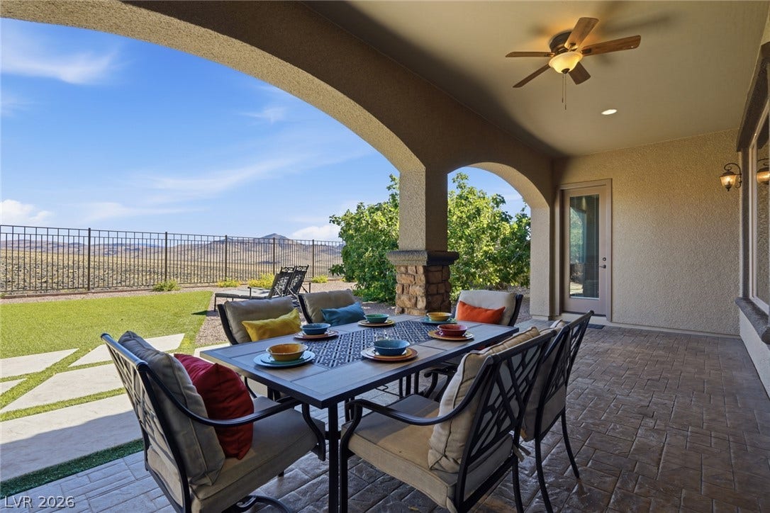 2397 Luberon Drive, Henderson, NV 89044 An inviting covered patio offers outdoor dining with breathtaking desert and mountain views.