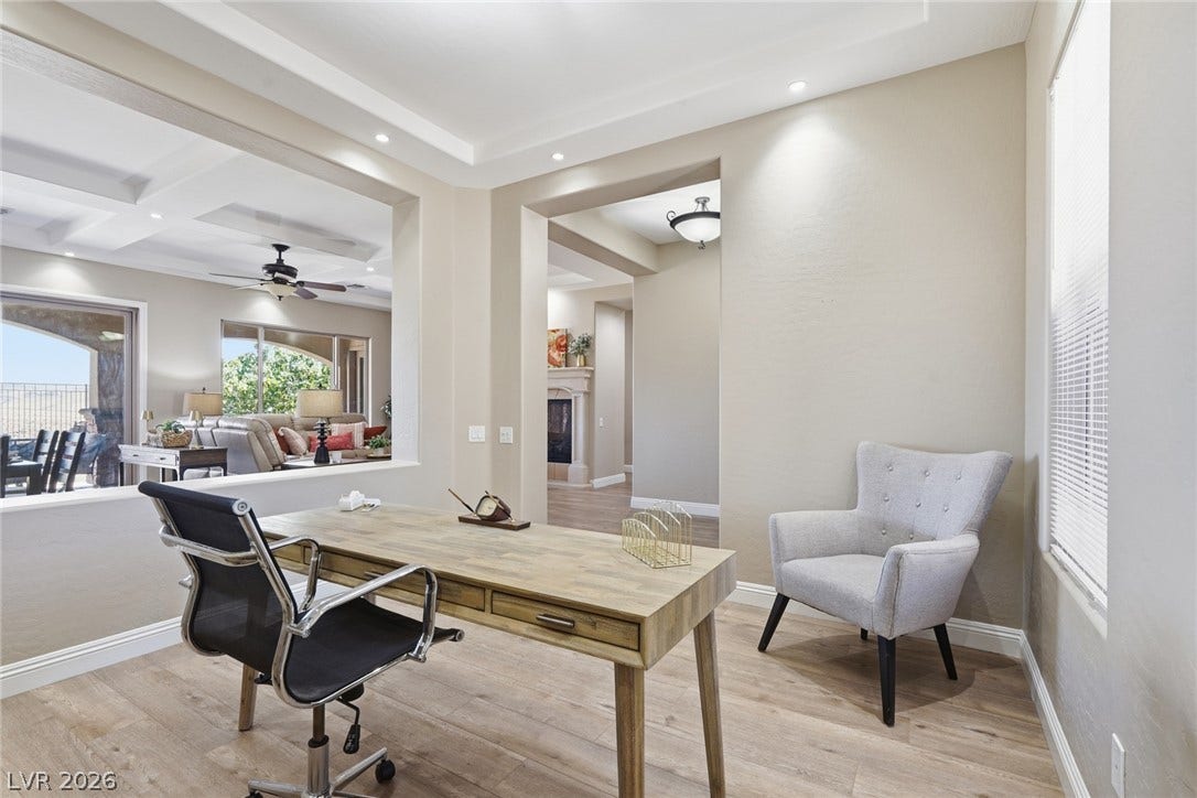 2397 Luberon Drive, Henderson, NV 89044 A dedicated home office provides a private and functional workspace with a view into the living areas.