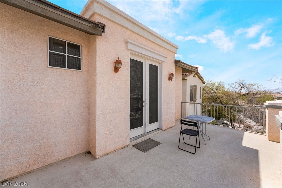 2439 Kaymin Ridge Road, Henderson, NV 89052 An inviting private patio space offers an excellent outdoor retreat.