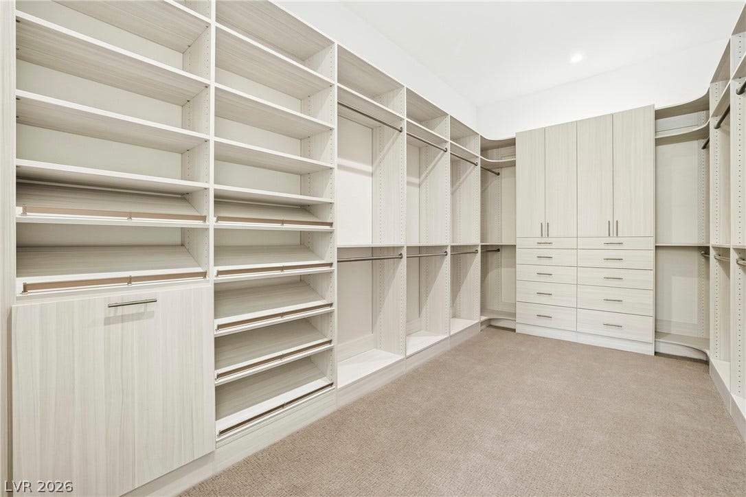 4360 Conough Lane, Las Vegas, NV 89129 Ample storage solutions abound in this well-appointed dressing room, complete with shelving, hanging space, and built-in drawers.
