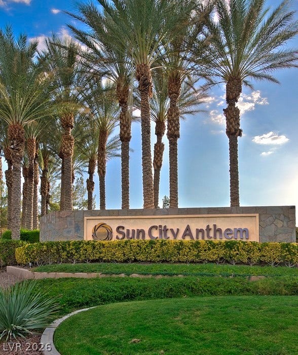 2141 Colvin Run Drive, Henderson, NV 89052 Welcoming entry to Sun City Anthem with manicured landscaping and tall palms.
