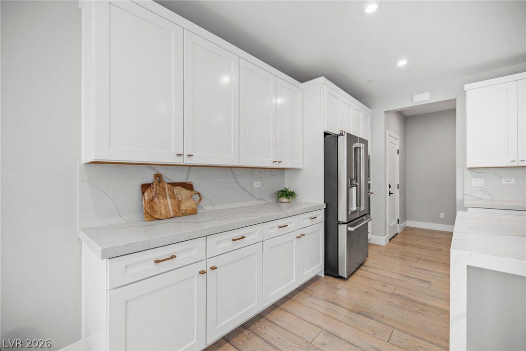 3194 Poplar Crest Court, Henderson, NV 89044 Clean lines and light wood flooring define this contemporary culinary space.