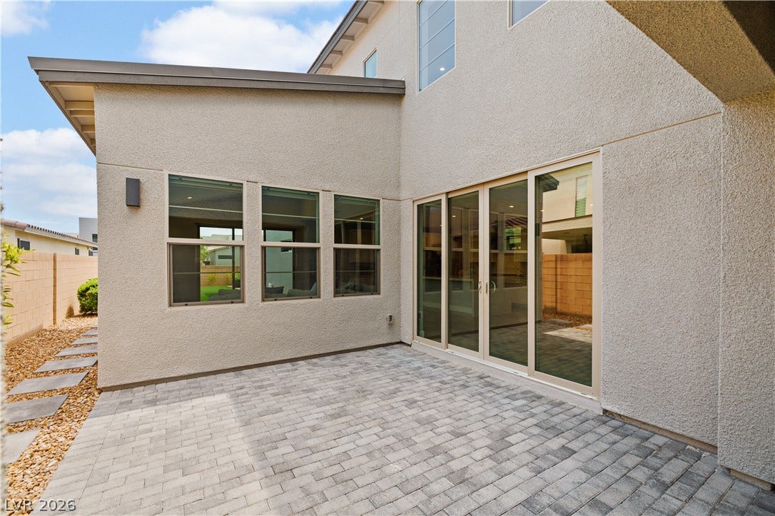 3194 Poplar Crest Court, Henderson, NV 89044 Paver stone patio sets a perfect foundation for outdoor entertaining and relaxation.