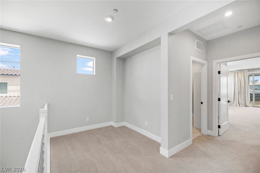 3194 Poplar Crest Court, Henderson, NV 89044 A versatile open loft area provides additional living space with plush carpeting and natural light.