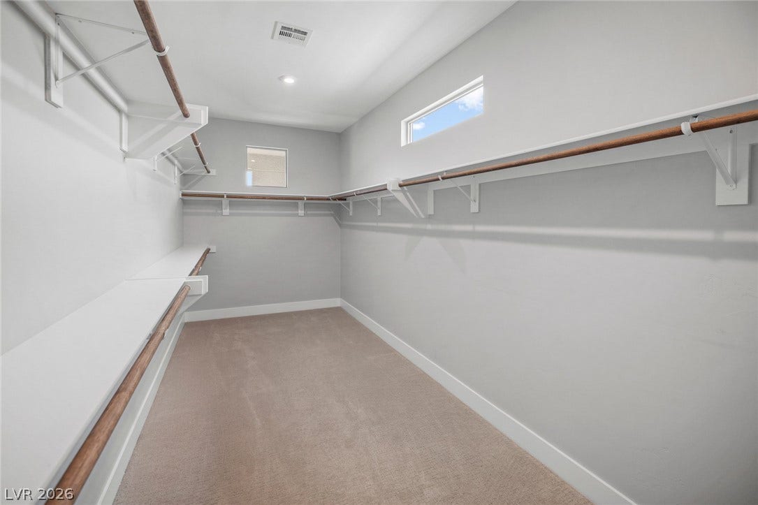 3194 Poplar Crest Court, Henderson, NV 89044 Ample shelving and hanging space defines this functional, well-designed closet.
