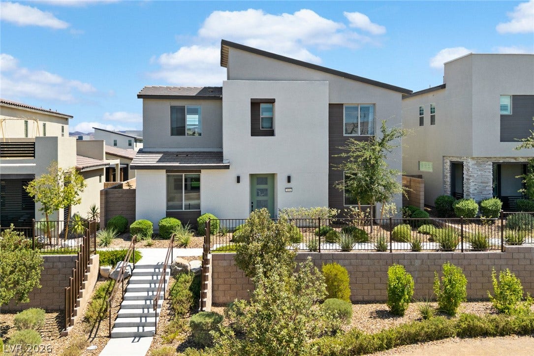 3194 Poplar Crest Court, Henderson, NV 89044 Modern architecture with a sleek design and meticulously landscaped terraced entry creates striking curb appeal.