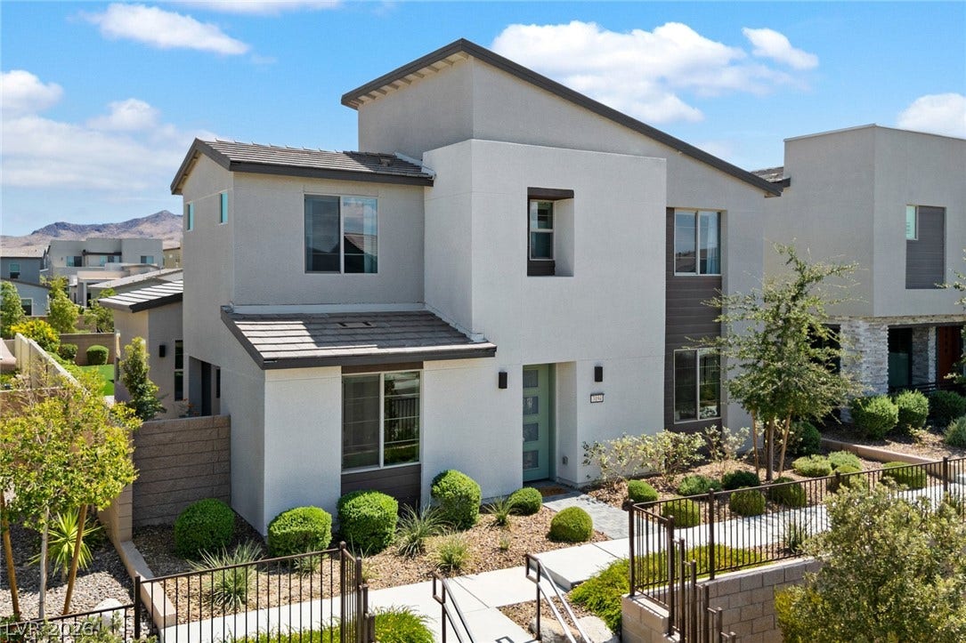 3194 Poplar Crest Court, Henderson, NV 89044 A striking modern facade with clean lines and a thoughtfully landscaped approach.