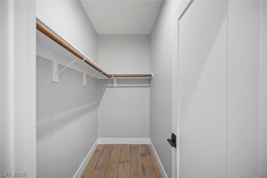 3194 Poplar Crest Court, Henderson, NV 89044 Ample closet space with sturdy rods and durable wood flooring.
