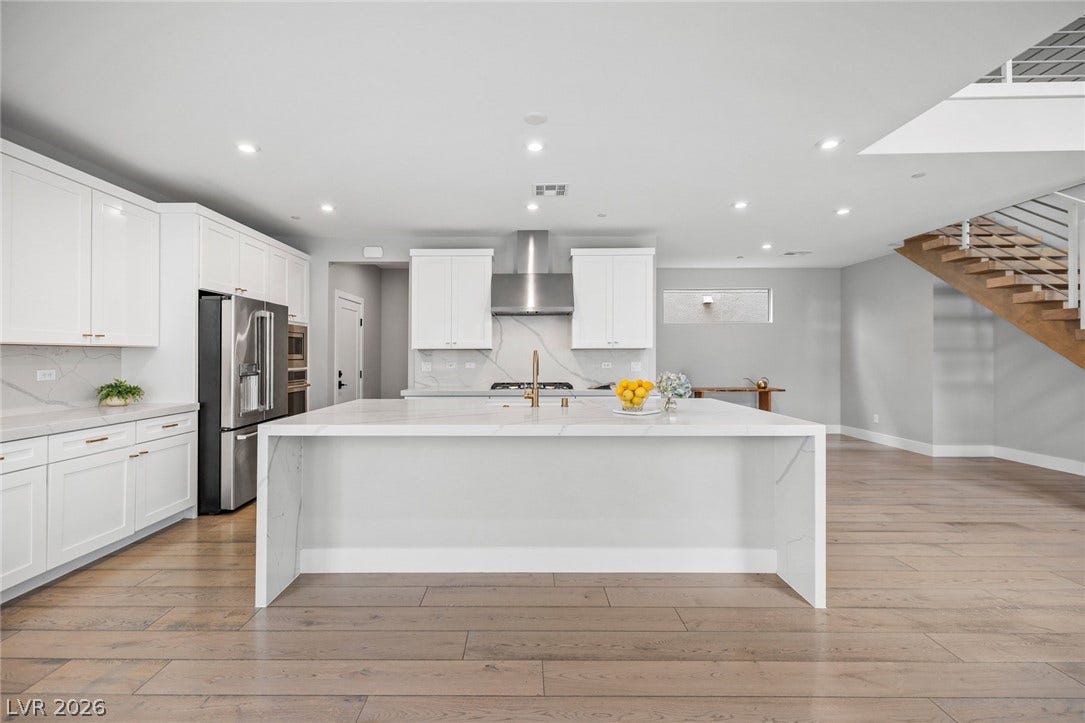 3194 Poplar Crest Court, Henderson, NV 89044 A well-appointed kitchen showcasing an inviting center island with ample counter space.