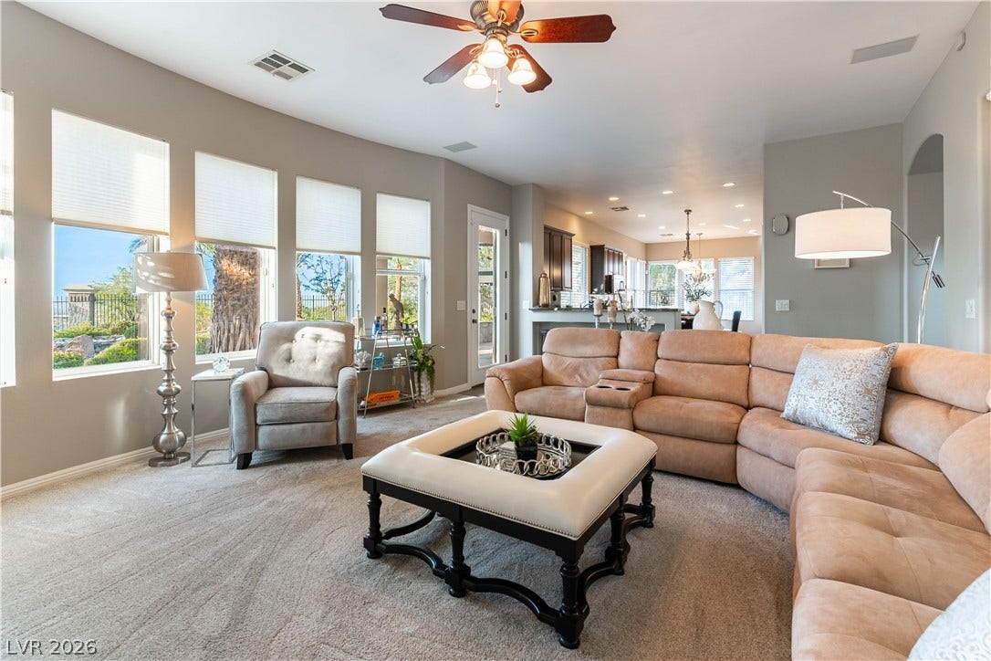 2676 Botticelli Drive, Henderson, NV 89052 A comfortable living space boasts lots of windows for the awesome views and abundant natural light.