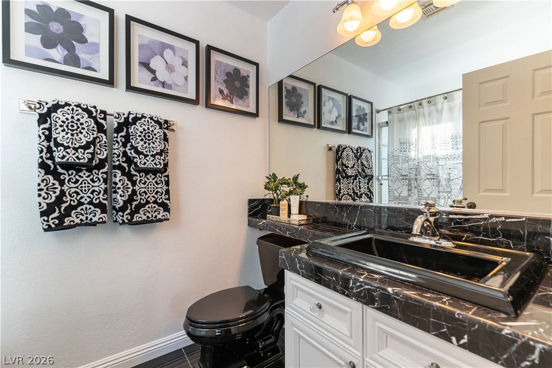 2676 Botticelli Drive, Henderson, NV 89052 Full bathroom off the bonus room beautiful marble counter tops.
