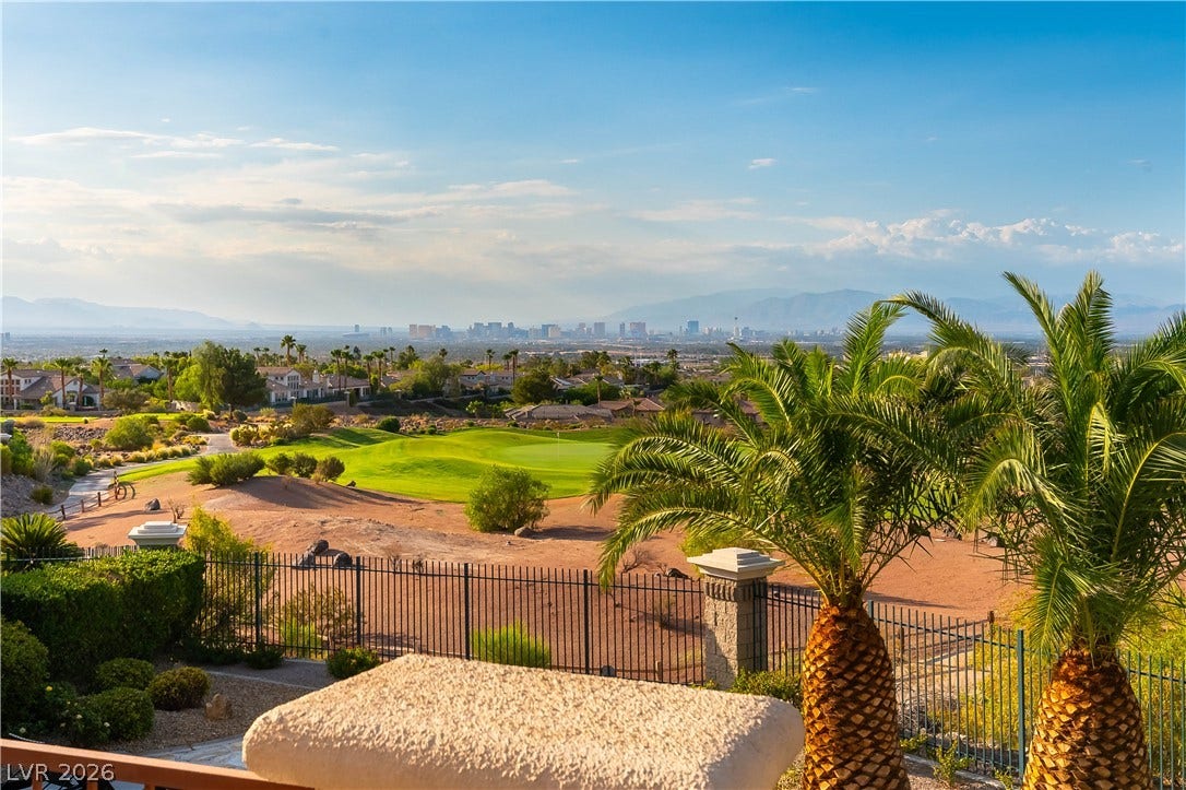 2676 Botticelli Drive, Henderson, NV 89052 Golf course frontage with a wide-ranging strip views, city lights and the distant mountains.