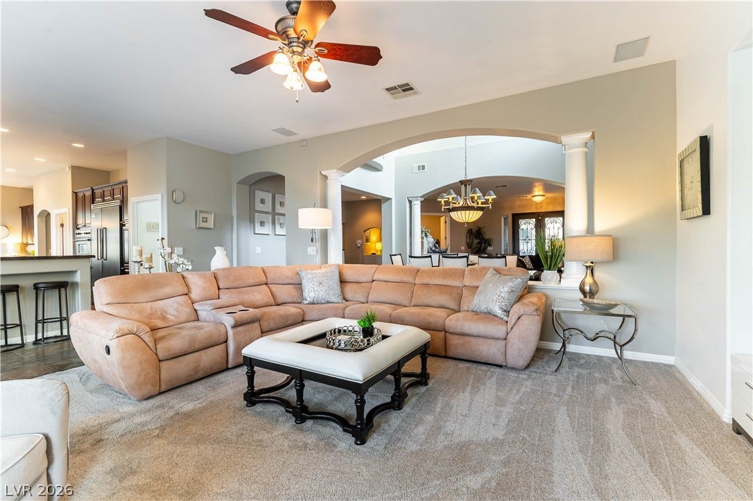 2676 Botticelli Drive, Henderson, NV 89052 An inviting great room with an open-concept design seamlessly connects living and kitchen spaces.