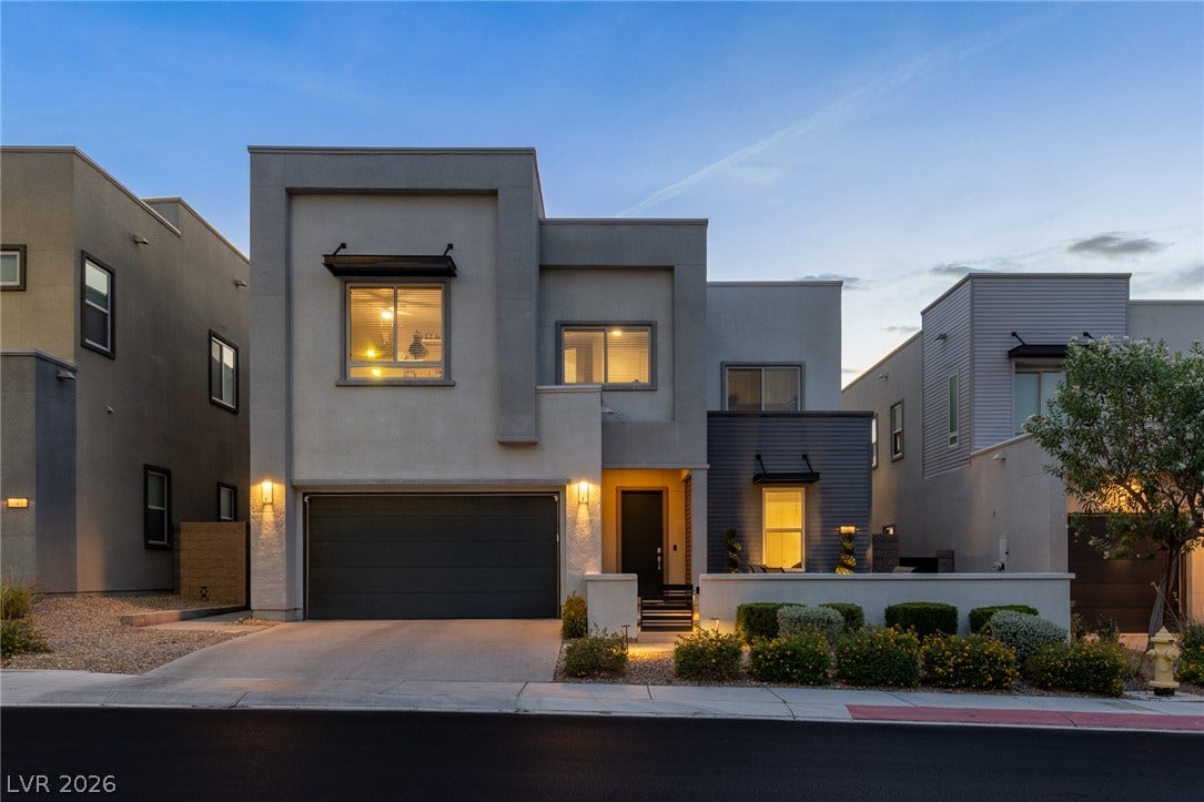 743 Glowing Horizon Street, Henderson, NV 89052 Clean lines and modern architectural detailing define the facade of this contemporary multi-level residence.