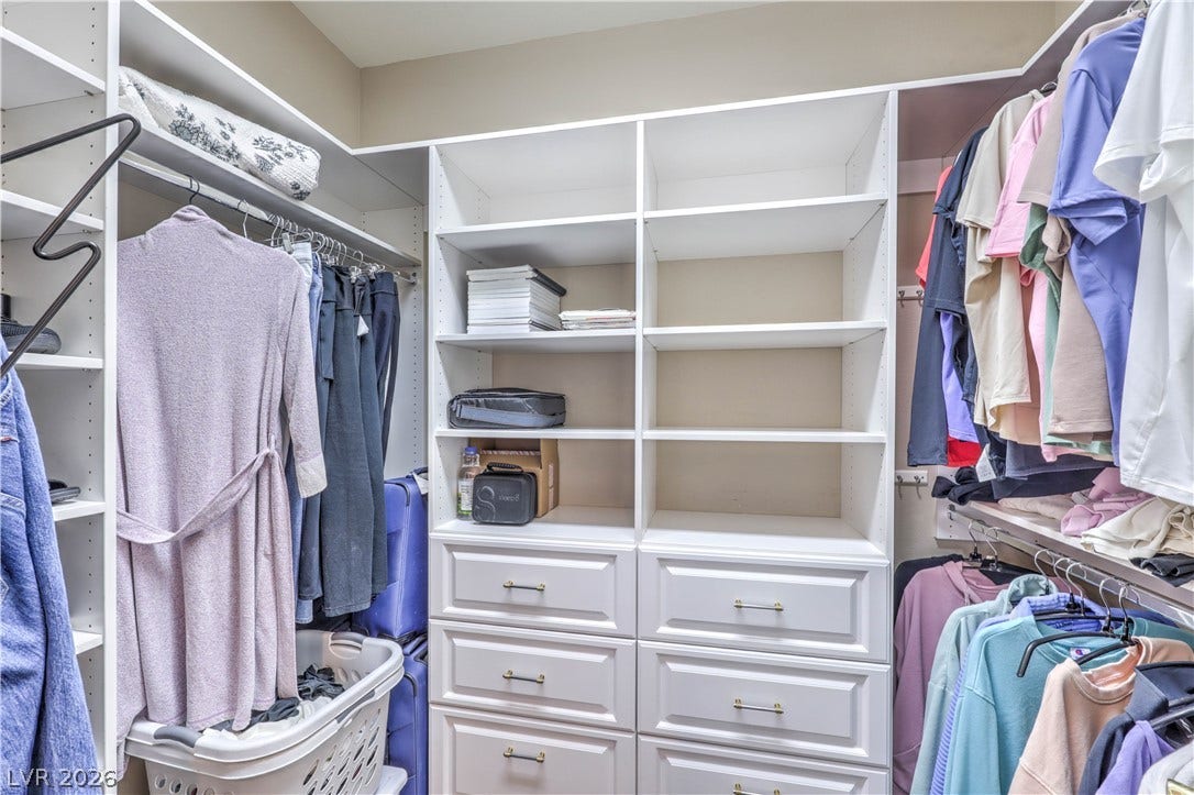 10298 Profeta Court, Las Vegas, NV 89135 Customized closet solutions featuring ample shelving and drawer space for optimal organization.