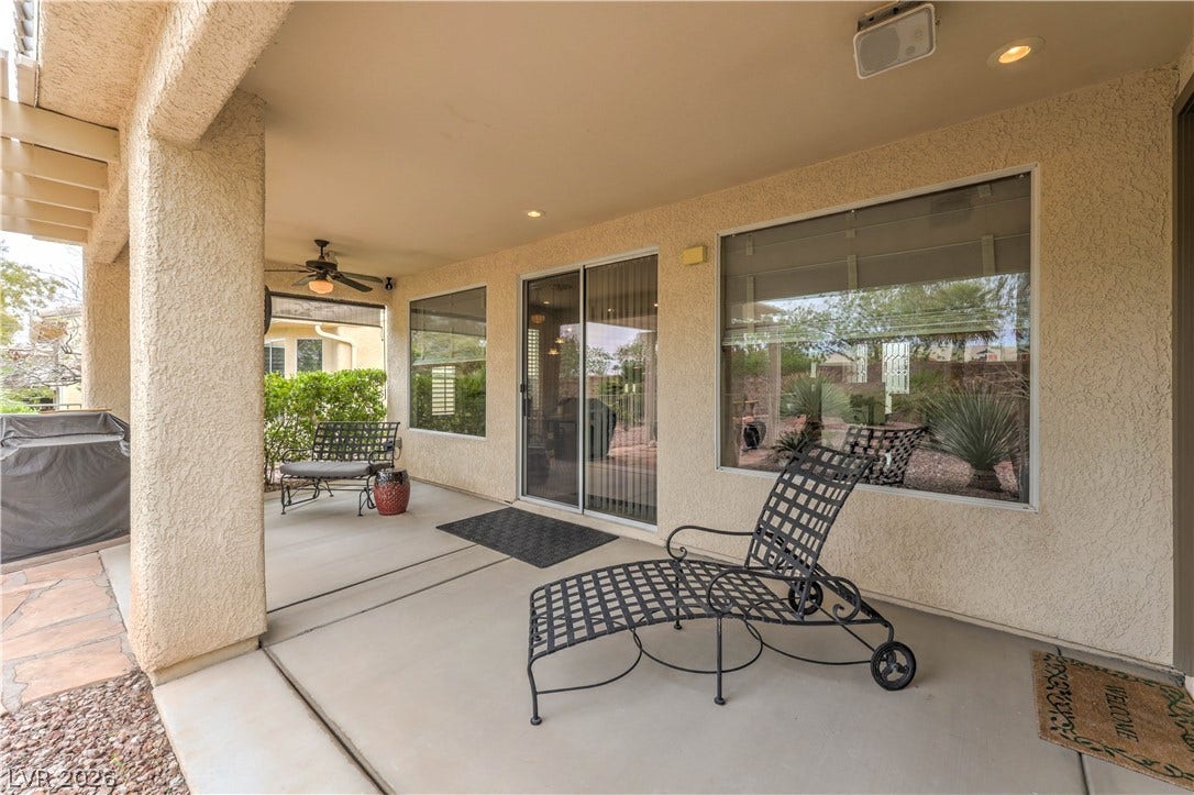 10298 Profeta Court, Las Vegas, NV 89135 An inviting covered patio offers a comfortable outdoor living space for relaxation and entertainment.