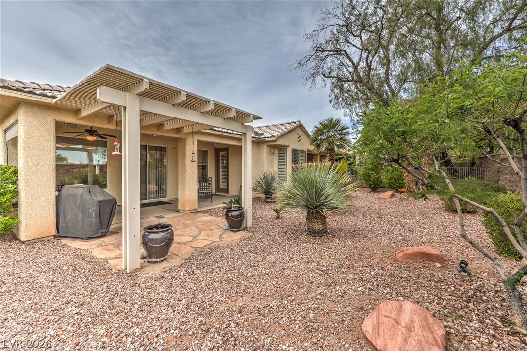 10298 Profeta Court, Las Vegas, NV 89135 An inviting covered patio adjoins a low-maintenance, xeriscaped private yard.