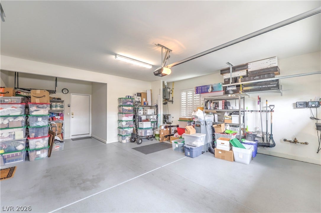 10298 Profeta Court, Las Vegas, NV 89135 A well-organized garage with ample overhead and wall storage solutions provides practical utility.