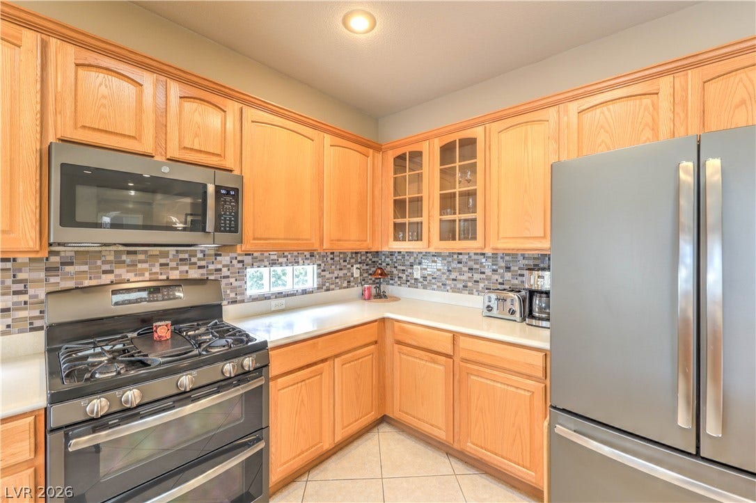 10298 Profeta Court, Las Vegas, NV 89135 A well-equipped kitchen showcasing sleek appliances and ample cabinetry.